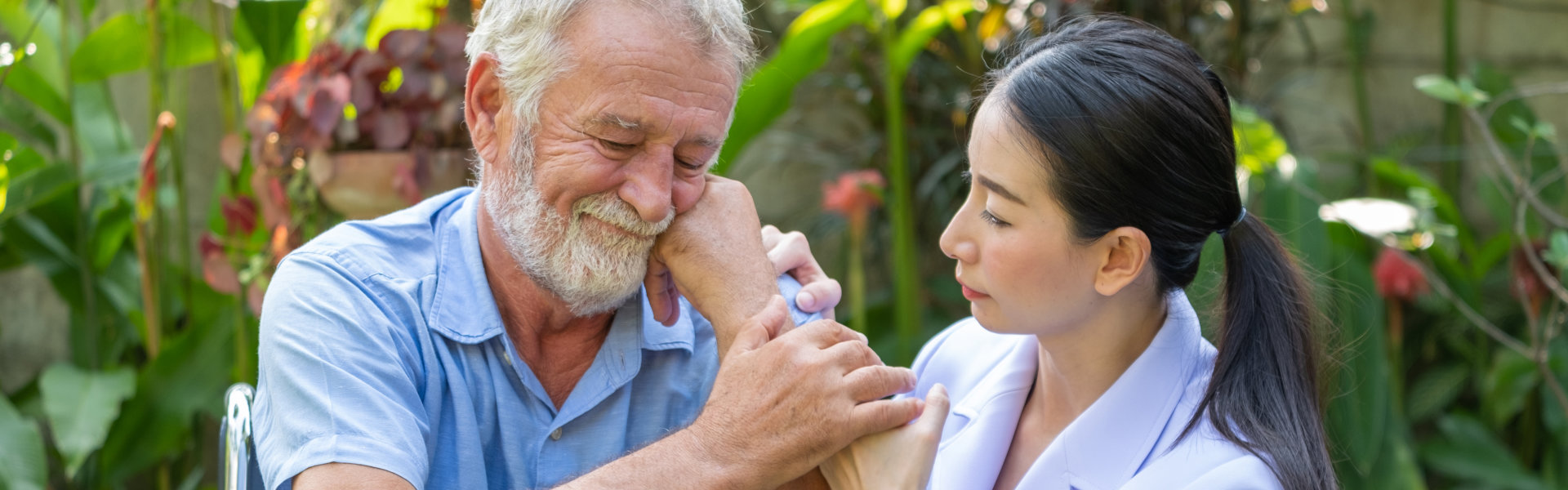 elderly holding the caregiver dearly