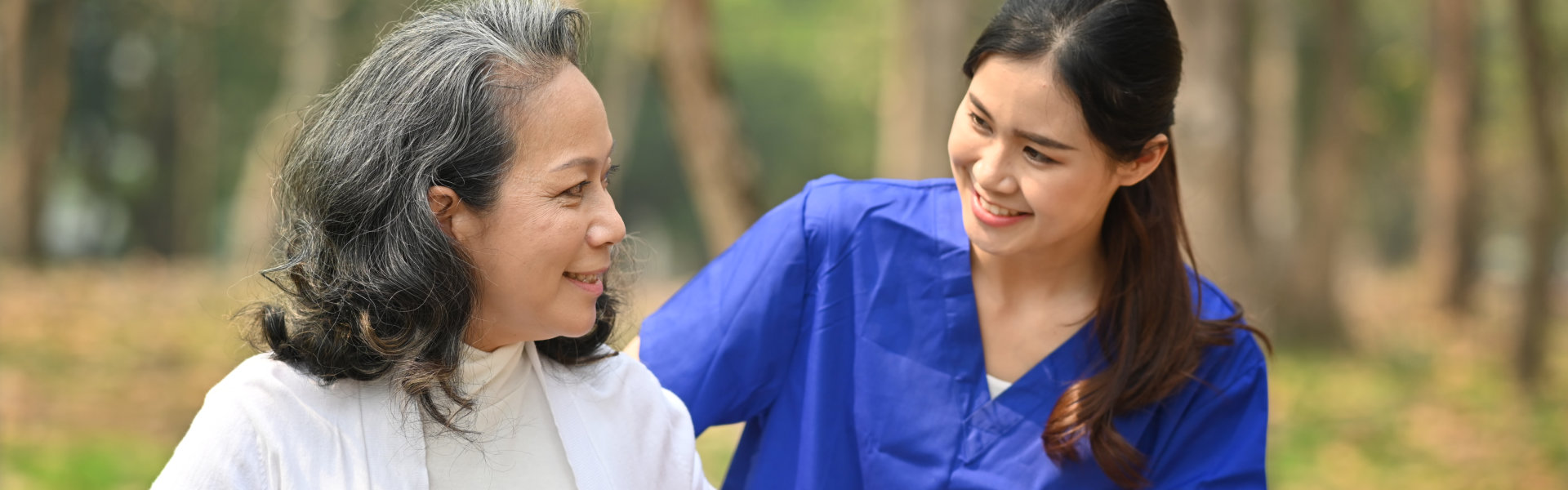 female caregiver looking at the senior