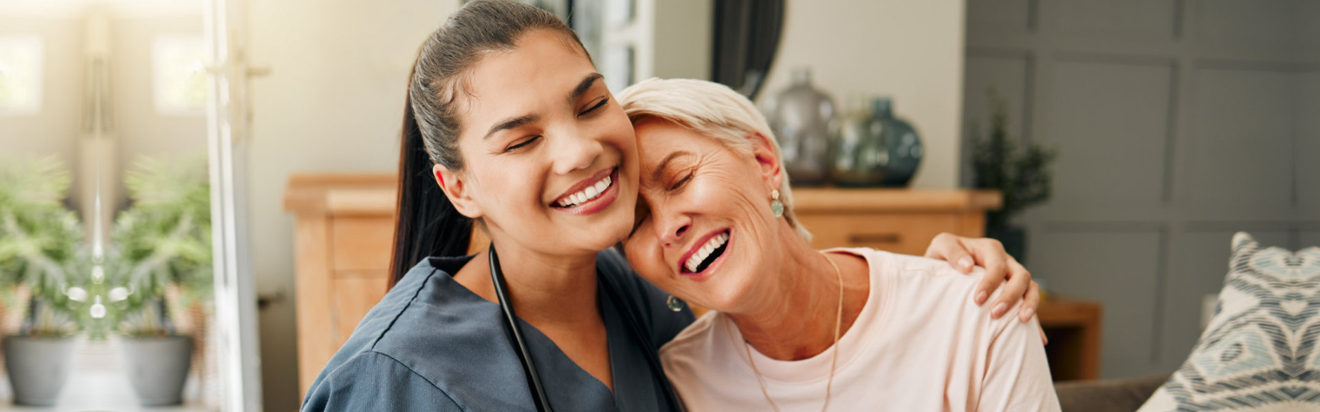 smiling senior woman and a nurse